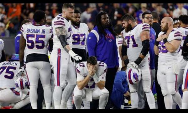 NFL-held Damar Hamlin keert terug naar de wedstrijd tegen Buffalo Bills na een hartstilstand